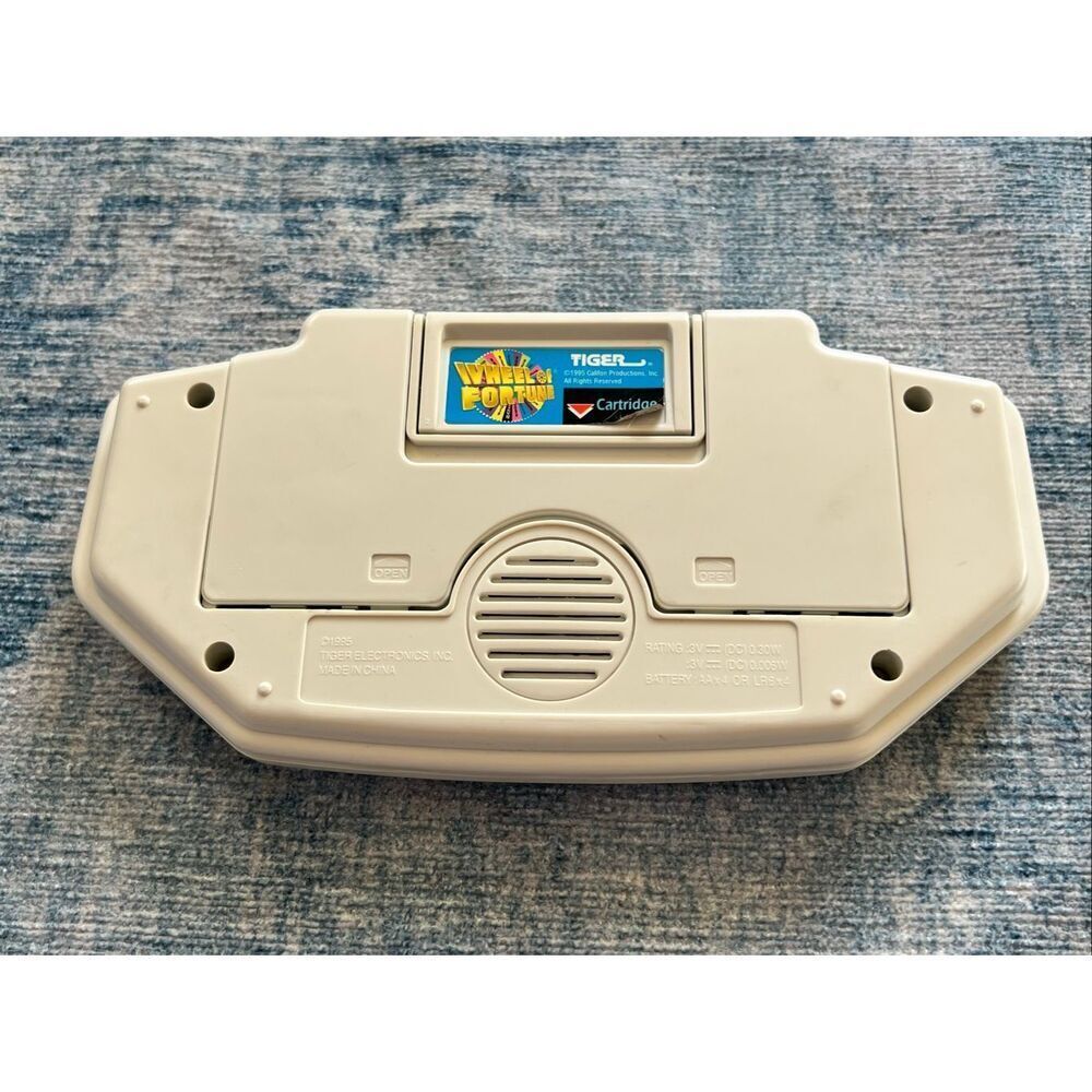 Vintage Tiger Electronics Handheld Wheel of Fortune Game - Picture 2 of 3